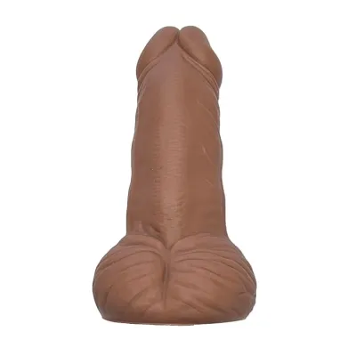 Ein brauner Hundespielzeug-Kauknochen in Form eines Penis.