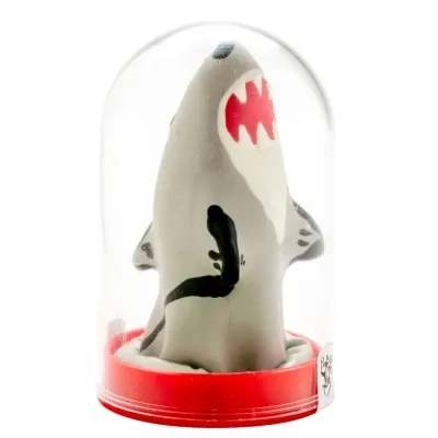 Grey shark with open mouth in a transparent dome on a red base.