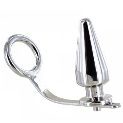 Metallic anal plug with ring handle and conical tip.
