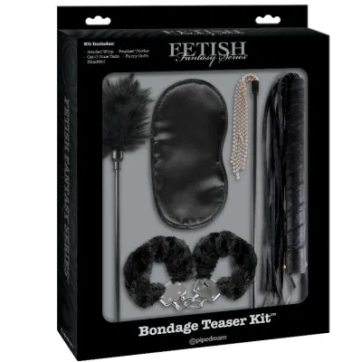 Bondage set including blindfold, feather tickler, handcuffs, whip and chain in black packaging.
