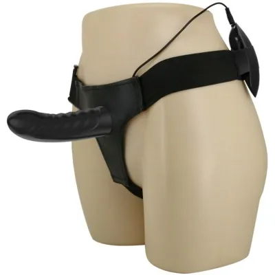 Black strap-on dildo with cable attached to a light-colored mannequin.