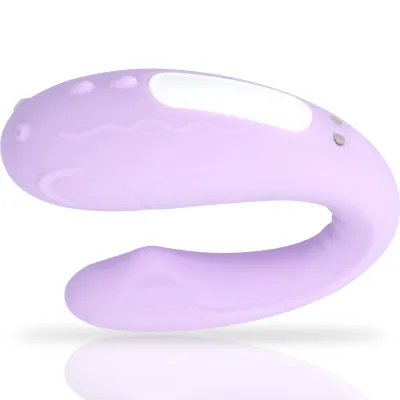 Lila, gebogenes Silikon-Sextoy mit glatter Oberfläche und Knöpfen.