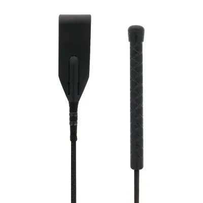 Black riding crop with braided handle and wide leather flap, on a white background.