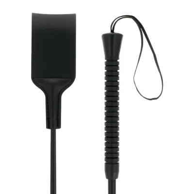 Black riding crop with grooved handle and wrist strap, next to a wide leather whip.