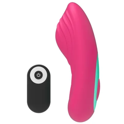 Pink vibrator with remote control, side view.