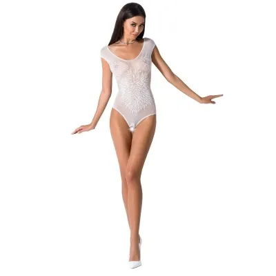 Woman in white lace bodysuit and white shoes posing against a white background.