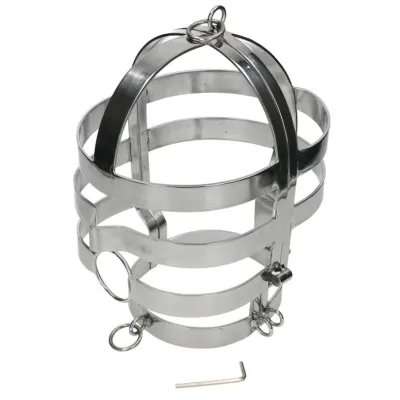 Metal cage with rings and wrench on a white background.