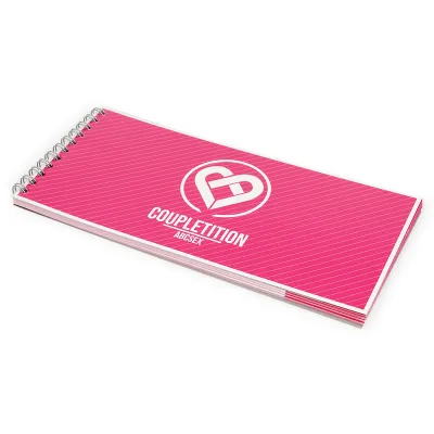 Pink spiral-bound book with the words "Coupletition ABCSEX" on the cover.