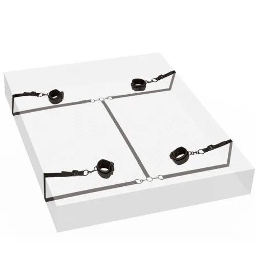 Black restraints with straps on a mattress, fastened in the four corners.