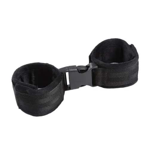 Black handcuffs with buckle closure on a white background.