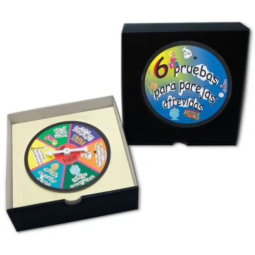 A game with a rotating disc in a box, labeled "6 pruebas para parejas atrevidas".
