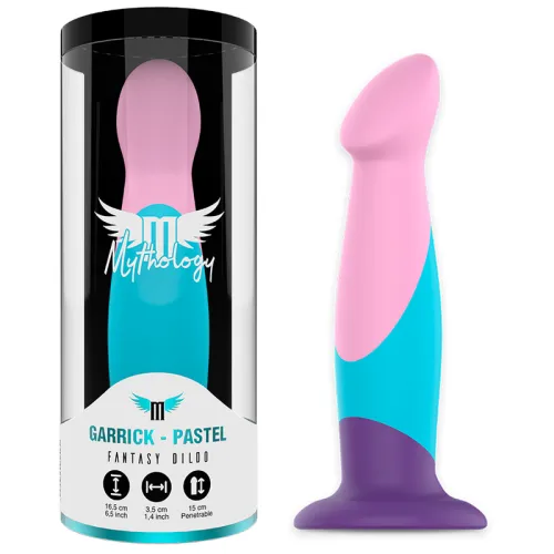 Packaging and pastel-colored dildo with pink, blue and purple sections, standing next to it.