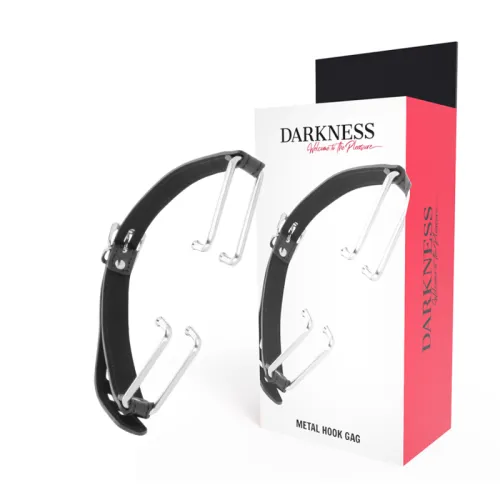 Schwarzes Metallhaken-Mundstück vor einer Verpackung mit der Aufschrift "Darkness".