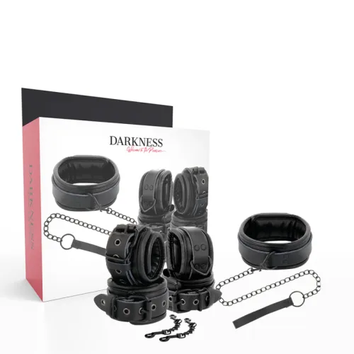 Black leather restraints with chains and packaging, brand "Darkness".