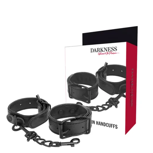 Schwarze Lederhandschellen mit Kette, Verpackung mit der Aufschrift "Darkness".