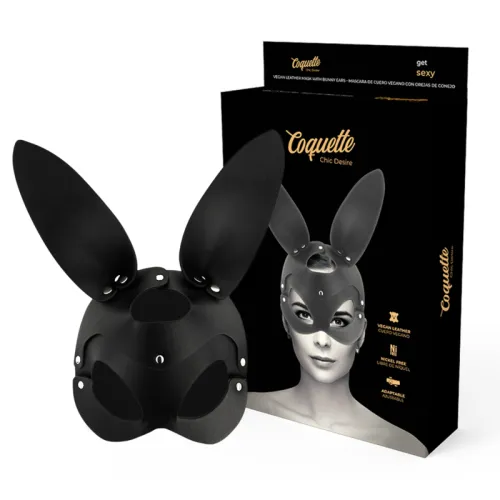 Black rabbit mask made of vegan leather in front of packaging with an image of a person wearing the mask.