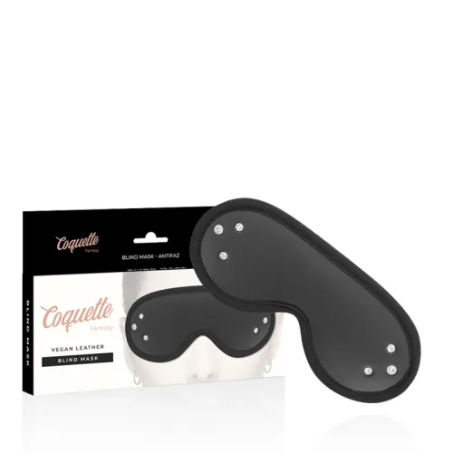 Black vegan leather eye mask with packaging, decorated with small silver studs.