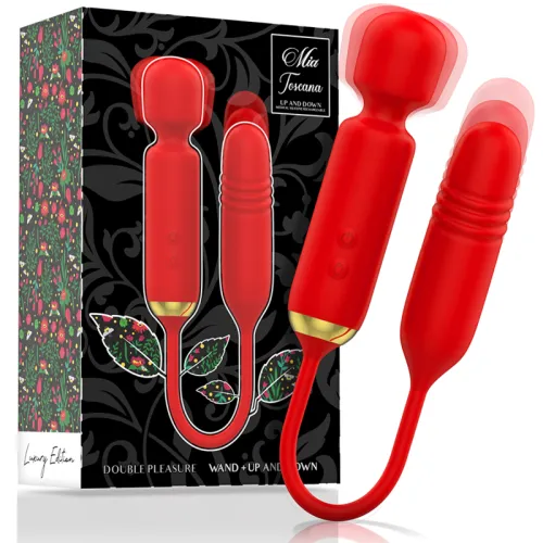 Red vibrator with golden accents, in front of a decorative package with floral patterns.