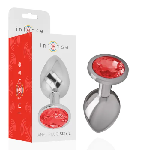 Silver anal plug with red crystal, packaging in the background, brand "Intense", size L.