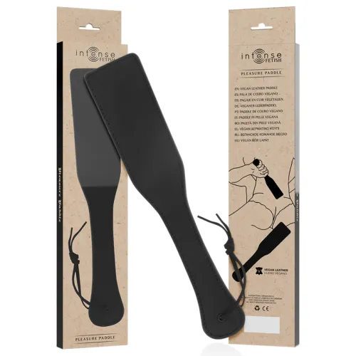 Schwarzes Paddle aus veganem Leder, verpackt in einer Box mit mehrsprachiger Beschriftung und Zeichnung.