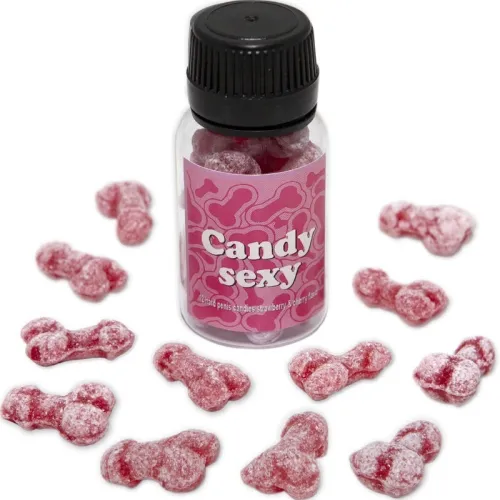 A bottle containing pink, penis-shaped candies labeled "Candy Sexy". Candies are scattered around the bottle.