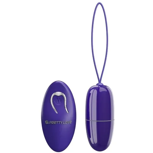 Lila Vibrator mit Fernbedienung, beide mit glatter Oberfläche und silbernen Akzenten, auf weißem Hintergrund.