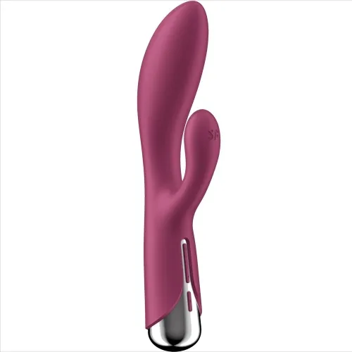Rosa Vibrator mit zwei Armen und silbernem Griff, auf weißem Hintergrund.