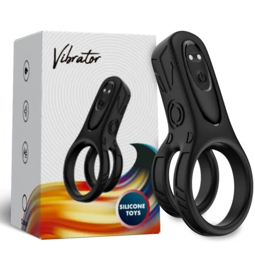 Black silicone vibrator with two rings, pictured in front of the colorful packaging.