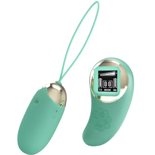 Two green, egg-shaped devices with gold accents and a display that shows settings.