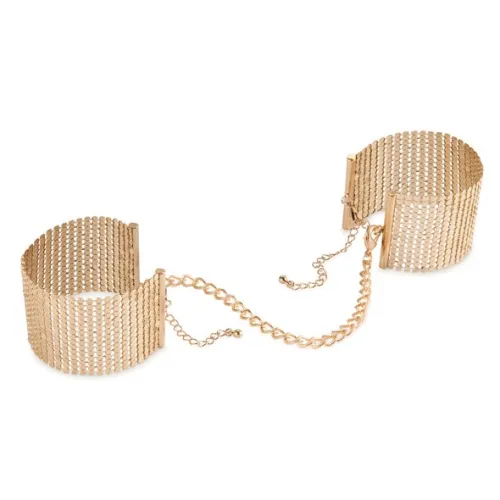 Golden cuff bracelets connected by chain links.