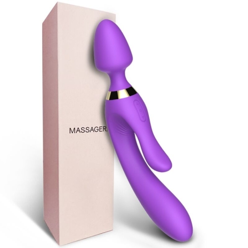 Purple massage device with gold accents next to packaging labeled "Massager".