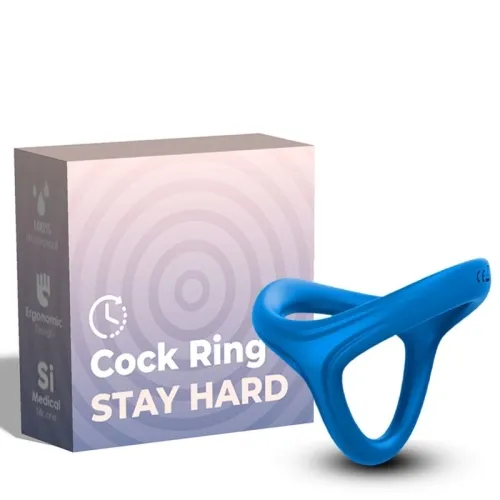 Blue cock ring in front of packaging with the inscription "Cock Ring Stay Hard", ergonomic design, medical-grade silicone.