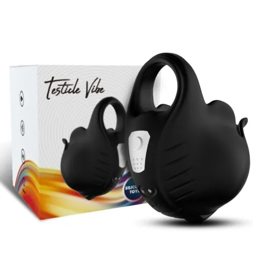 Black massage device with packaging, inscription "Testicle Vibe", colorful waves on the box.