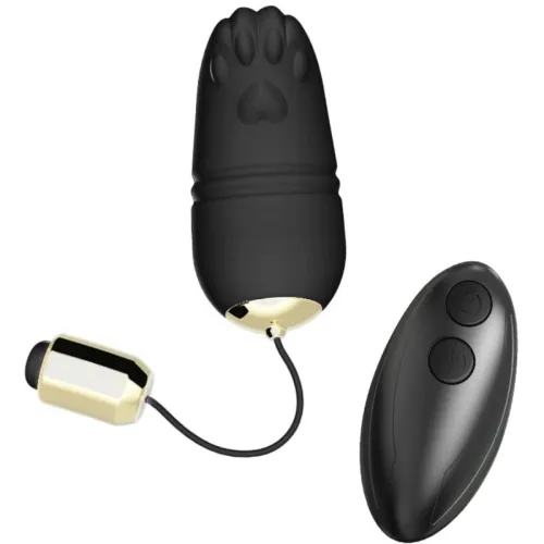 Black, egg-shaped massage device with paw print pattern and remote control, gold accents.