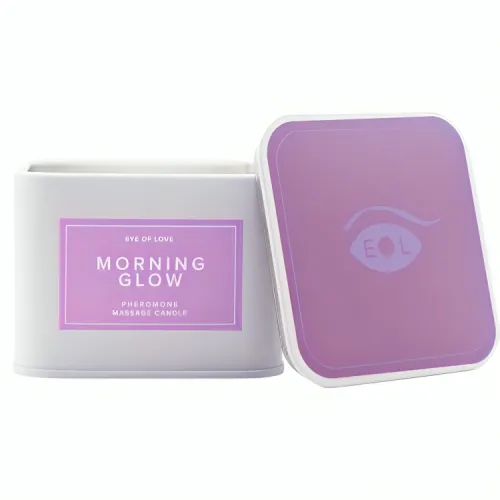 Purple massage candle "Morning Glow" by Eye of Love, rectangular tin with lid removed.