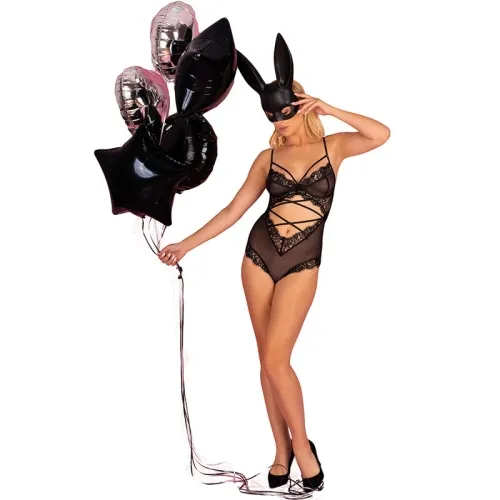 Person in black lace bodysuit and rabbit mask holding black and silver balloons.