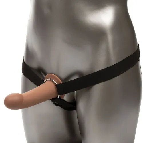 Mannequin mit einem Strap-On-Dildo, befestigt mit einem schwarzen Gurt.