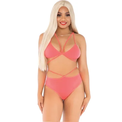 Woman in a pink bikini with long blonde hair and red lipstick, smiling.