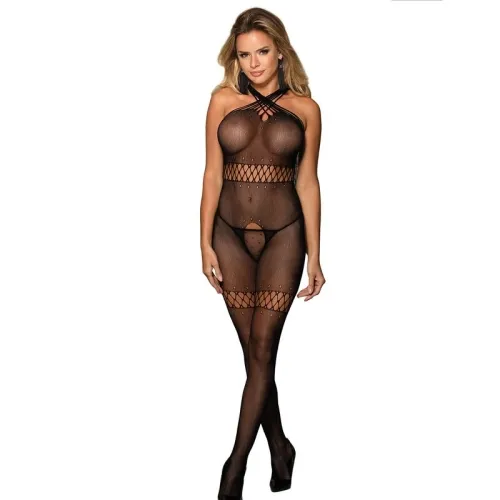 Woman in black mesh bodysuit with cross straps and earrings, posing in front of a white background.