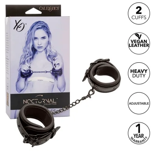Verpackung und schwarze Handschellen aus veganem Leder, schwer belastbar, verstellbar, mit 1 Jahr Garantie.