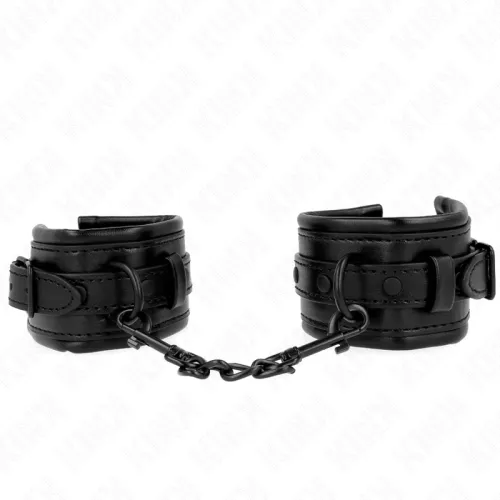 Black leather handcuffs with chain, on a white background.