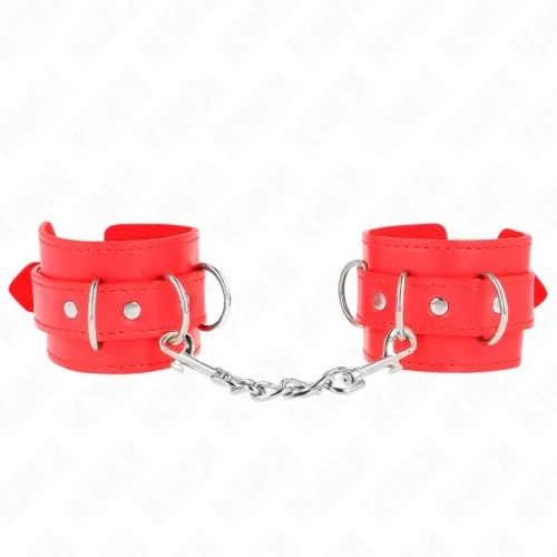 Rote Handfesseln aus Leder mit Metallkette und Schnallen auf weißem Hintergrund.