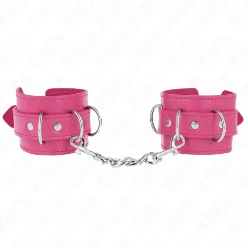 Pink leather handcuffs with metal chain and buckles, on a white background.