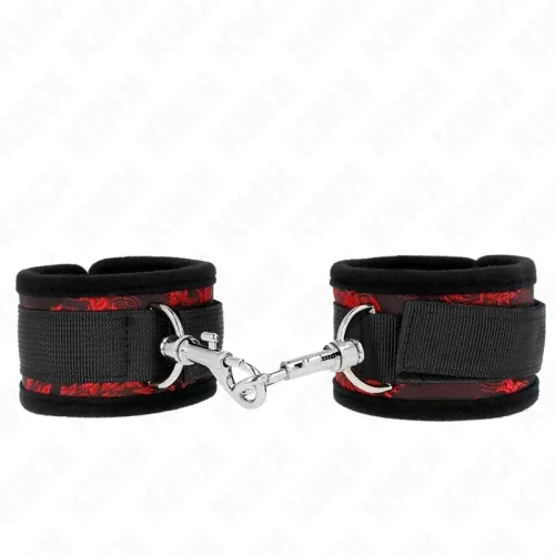 Black and red handcuffs with metal connection, on a white background.