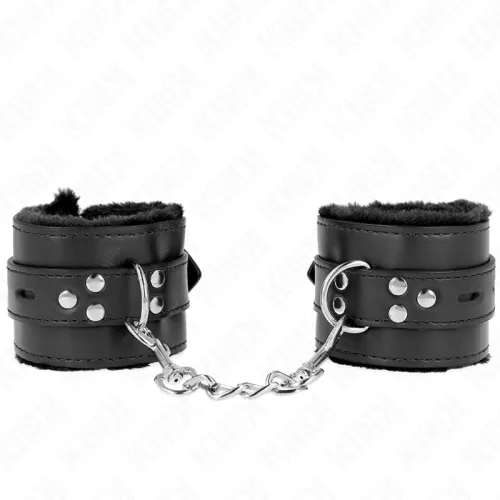 Schwarze Leder-Handfesseln mit Kette und Nieten, innen mit weichem Material gefüttert.