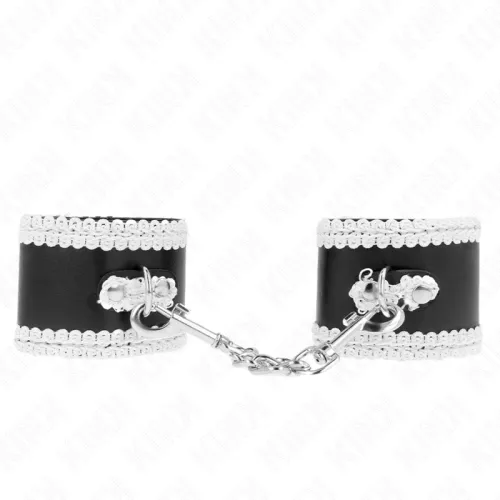 Schwarze Handfesseln mit weißer Spitze und Kette, auf weißem Hintergrund.