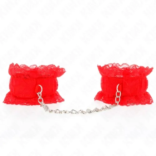 Red lace handcuffs with chain on a white background.