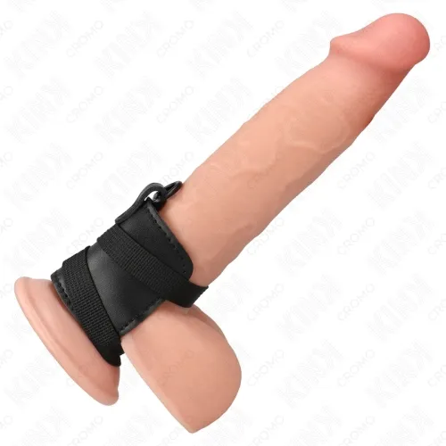 A dildo with a black strap around the base, on a white background.