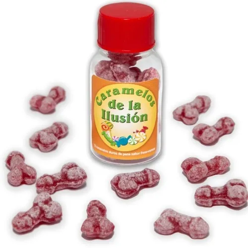 A bottle containing red, penis-shaped candies labeled "Caramelos de la Ilusión". Candies are scattered around the bottle.