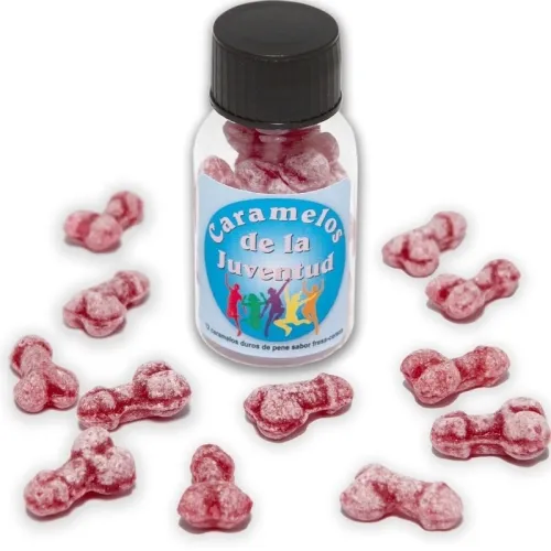 Flasche mit roten Bonbons in Penisform, Etikett "Caramelos de la Juventud", einige Bonbons liegen daneben.